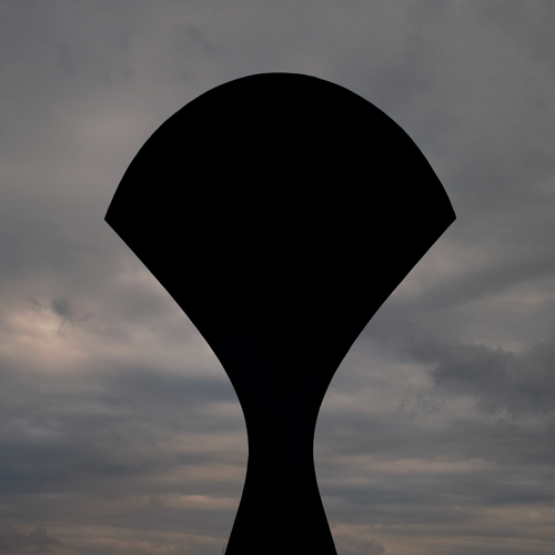 Sculpture seen in shadow against late evening sky in Rijeka, Croatia